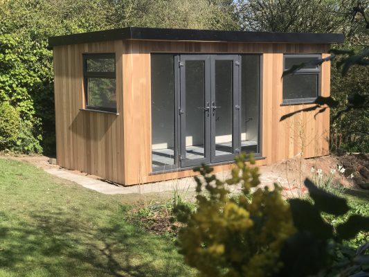 Garden room with double doors manufactured and installed by Viking Garden Buildings in Stafford