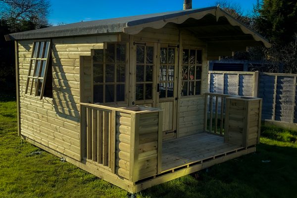 Summerhouse with terrace by Viking Garden Buildings manufactured and installed by Viking Garden Buildings in Stafford