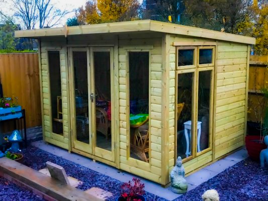 Contemporary Pent Summer House manufactured and installed by Viking Garden Buildings in Stafford