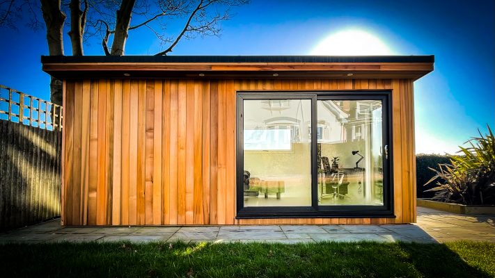 Cedar Garden Room with patio doors manufactured and installed by Viking Garden Buildings in Stafford