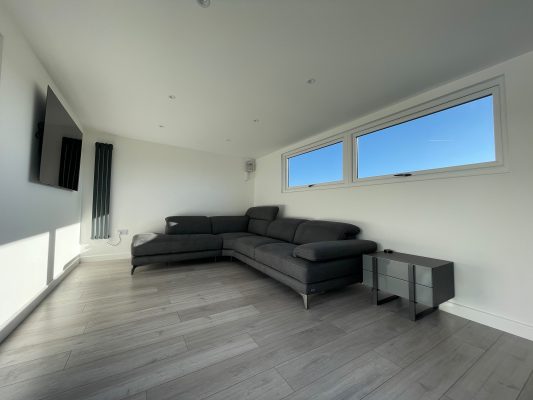 Inside garden room that is insulated and heated manufactured and installed by Viking Garden Buildings in Stafford