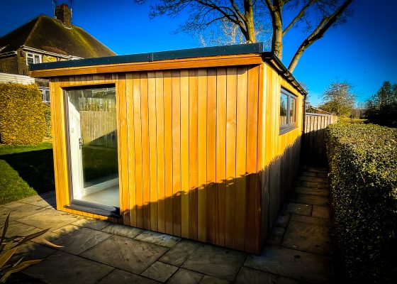 Pent garden office with long window on side manufactured and installed by Viking Garden Buildings in Stafford