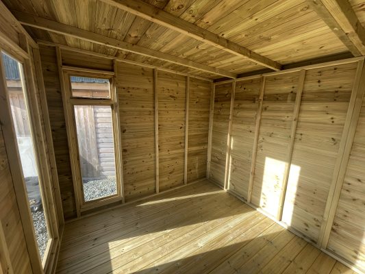 Internal shot of wooden garden room manufactured and installed by Viking Garden Buildings in Stafford