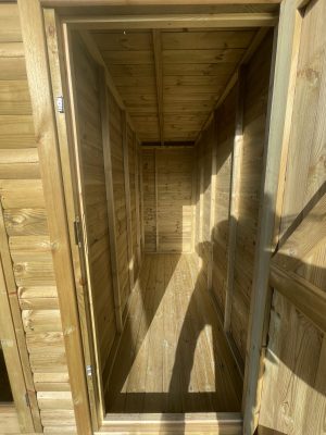 Inside combination garden shed manufactured and installed by Viking Garden Buildings in Stafford